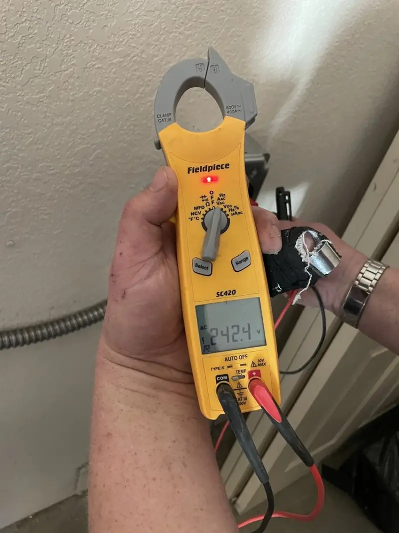 Voltage testing with clamp meter during Generator Installation in Fruitville